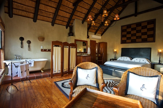 En suite luxury room with free standing bath at Indlovu River Lodge, Greater Kruger Park